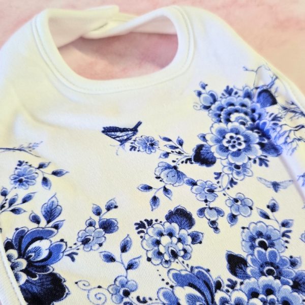 Floral baby bib with blue floral design
